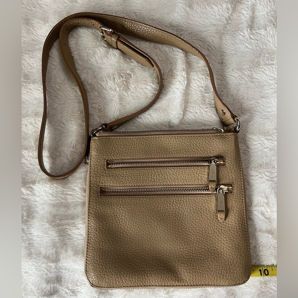Cole Haan Tan Leather Crossbody Bag with zip extender. Very good used condition